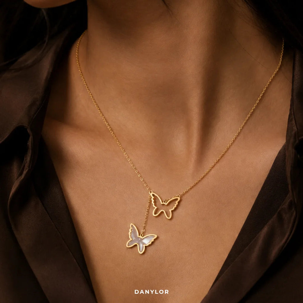 Danylor Butterfly Élan gold-tone necklace with two butterfly pendants
